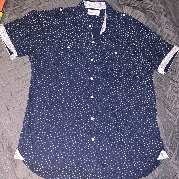 Paper, denim, and cloth button up - Picture 1 of 3